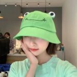 green frog hat